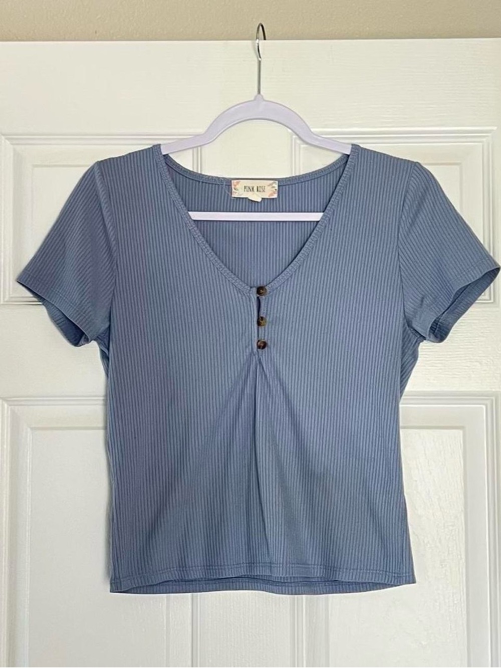 Ribbed dusty blue baby tee top with a cute fit and button detail